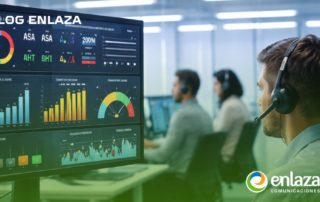 Support agent with headset monitors dashboards on a large screen in a busy control room; enlaza logo visible.